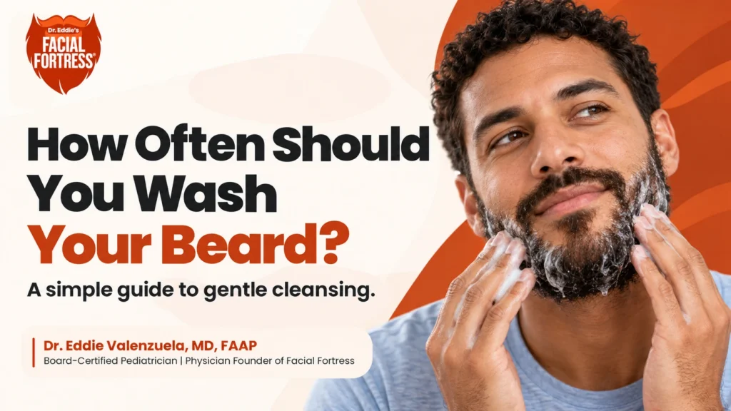 Man gently washing his beard with cleanser using his fingertips.